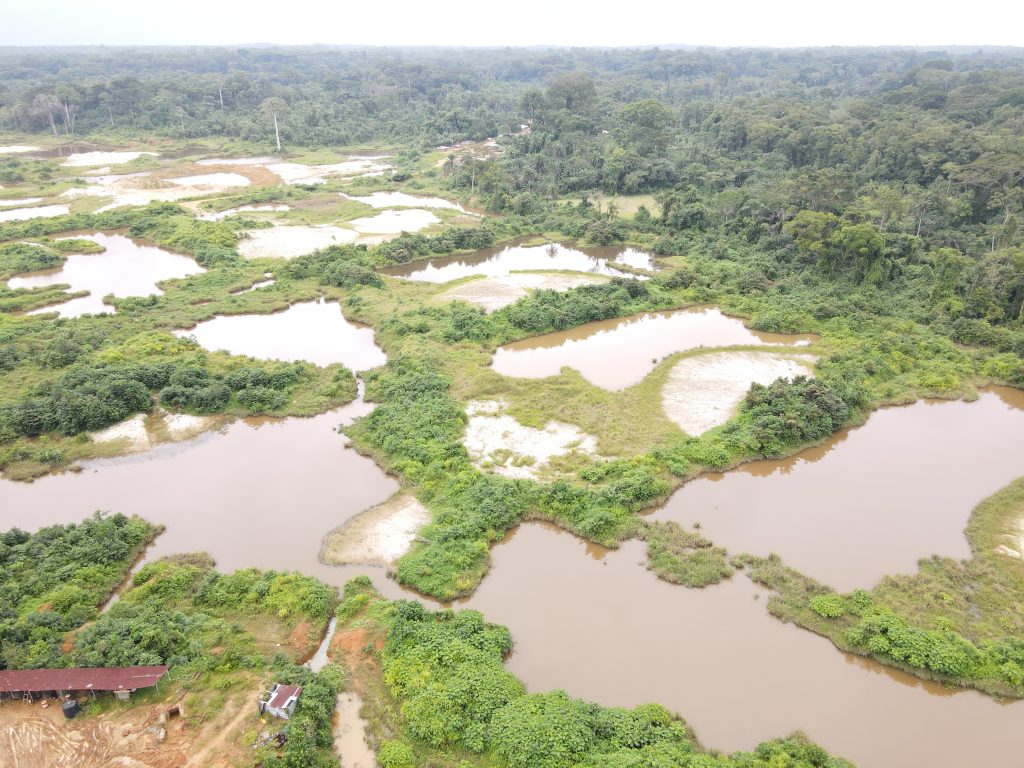 Drone picture shows deadly giant-sized mining pits in Gmarkemkpo, Sinoe County, where two people died.